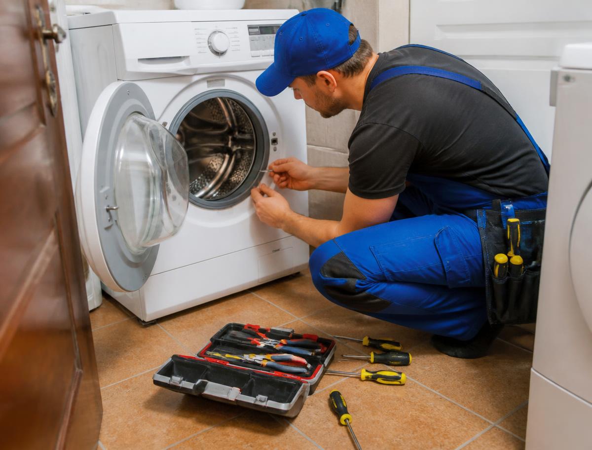 Appliance Repair professional at work in a South African property